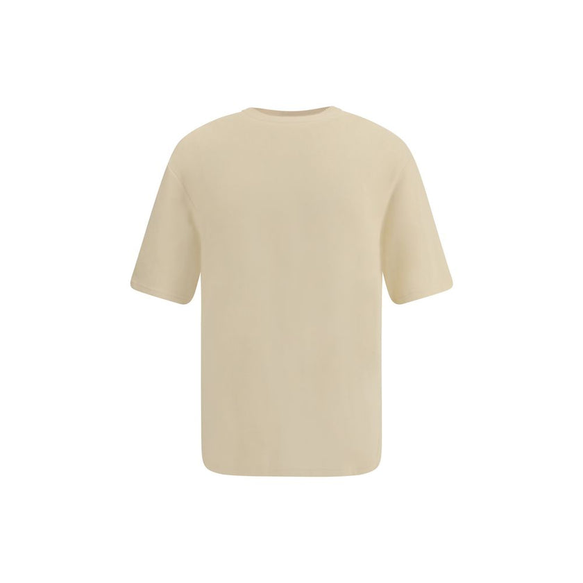 Cotton T-ShirtJacquemus’ cotton T-Shirt is an essential garment reinterpreted with the brand’s unmistakable style. Featuring an oversized cut, it offers a relaxed and contemporary fit, ideal for casual looks with a strong character. The ribbed crew neck e