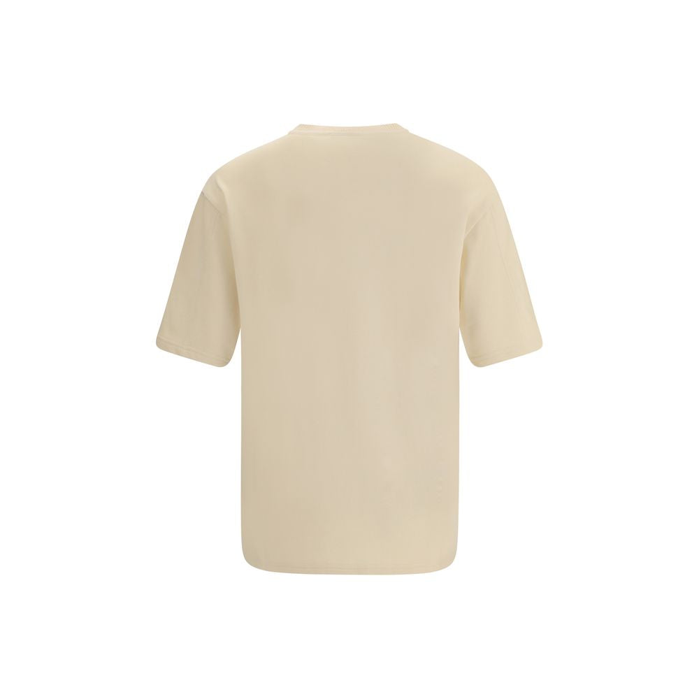 Cotton T-ShirtJacquemus’ cotton T-Shirt is an essential garment reinterpreted with the brand’s unmistakable style. Featuring an oversized cut, it offers a relaxed and contemporary fit, ideal for casual looks with a strong character. The ribbed crew neck e