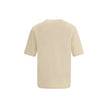 Cotton T-ShirtJacquemus’ cotton T-Shirt is an essential garment reinterpreted with the brand’s unmistakable style. Featuring an oversized cut, it offers a relaxed and contemporary fit, ideal for casual looks with a strong character. The ribbed crew neck e