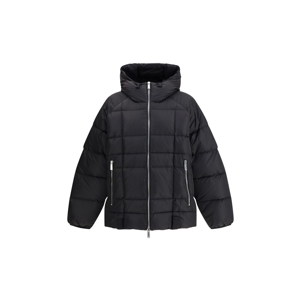 Black Polyamide CoatThe 3D long nylon Down Jacket by Dsquared2 is designed to offer maximum protection and style during the cold season. Featuring a quilted and padded design, it features a wrap-around hood, maxi zippered pockets ideal for storing essenti