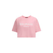 Logoed T-ShirtBalmain’s cotton cropped T-Shirt interprets urban style with the Maison’s signature elegance. Made of soft monochrome patterned cotton, it features a ribbed crew neck and a regular fit that flatters the figure while maintaining comfort. The