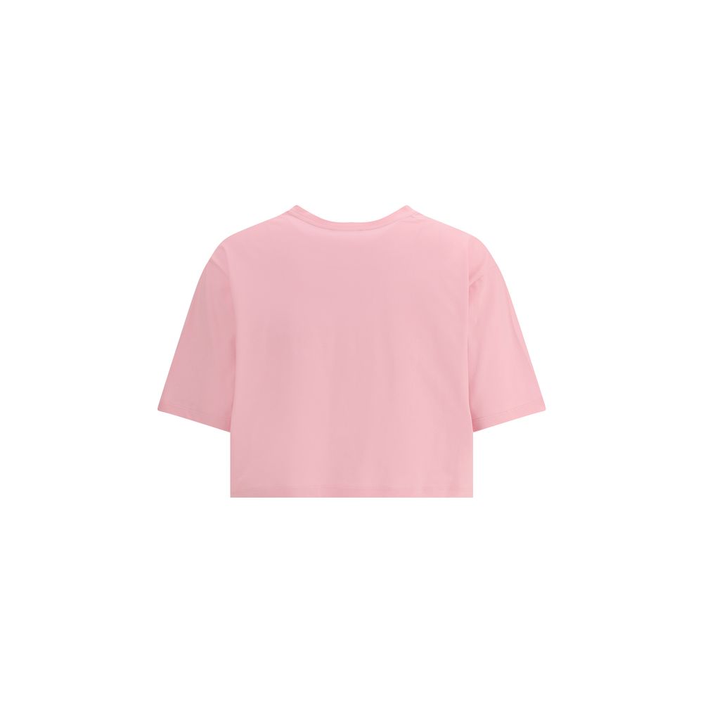 Logoed T-ShirtBalmain’s cotton cropped T-Shirt interprets urban style with the Maison’s signature elegance. Made of soft monochrome patterned cotton, it features a ribbed crew neck and a regular fit that flatters the figure while maintaining comfort. The