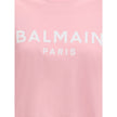 Logoed T-ShirtBalmain’s cotton cropped T-Shirt interprets urban style with the Maison’s signature elegance. Made of soft monochrome patterned cotton, it features a ribbed crew neck and a regular fit that flatters the figure while maintaining comfort. The