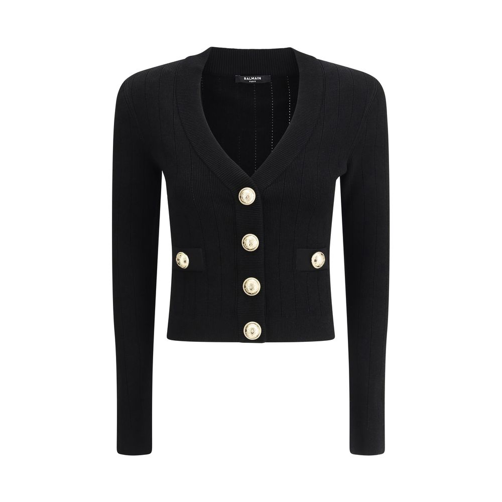 Black Viscose CardiganCardigan by Balmain, cropped design, v-neck on front, closure by embossed buttons, close fit, monochrome pattern. Season: AW25 Fit: Slim Composition: 83% Viscose 17% Polyester MADE IN FRANCEBlack Viscose Cardigan${tagsBalmainAulae Ca