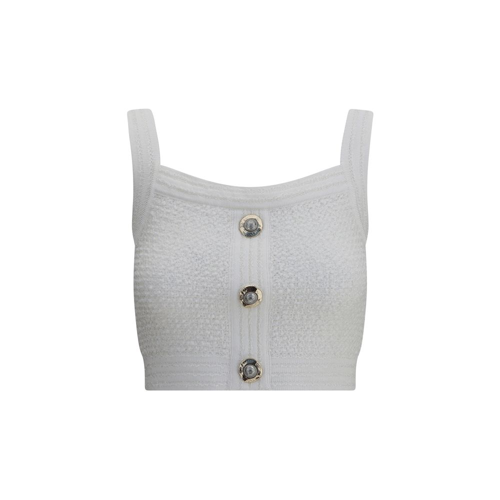 White Polyamide TopBalmain’s tweed crop Top is a bold and refined piece featuring a square neckline and thick straps that enhance the silhouette. Crafted in the Maison’s iconic tweed, it features a front closure with embossed buttons, a distinctive detail
