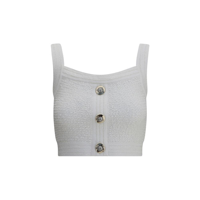 White Polyamide TopBalmain’s tweed crop Top is a bold and refined piece featuring a square neckline and thick straps that enhance the silhouette. Crafted in the Maison’s iconic tweed, it features a front closure with embossed buttons, a distinctive detail