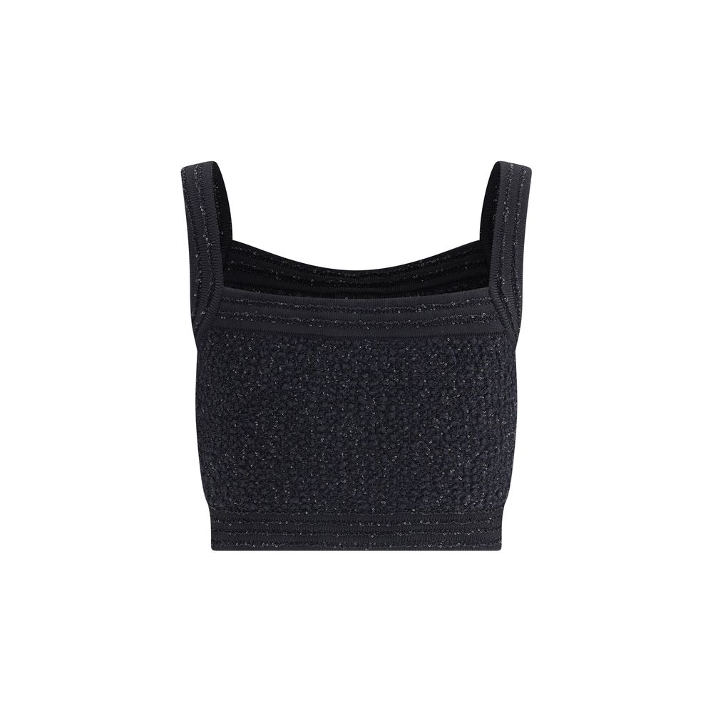 Black Polyamide TopBalmain’s tweed crop Top is a bold and refined piece featuring a square neckline and thick straps that enhance the silhouette. Crafted in the Maison’s iconic tweed, it features a front closure with embossed buttons, a distinctive detail