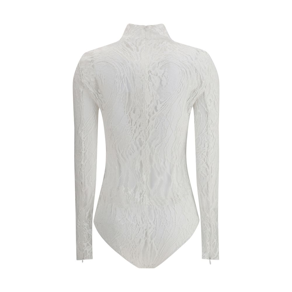 White Cotton TopThe Balmain lace Bodysuit is a seductive and sophisticated piece, featuring a refined high neck that enhances the elegance of the design. Crafted from sheer lace, it features a zip fastening on the back and buttons on the briefs, for a com