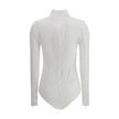 White Cotton TopThe Balmain lace Bodysuit is a seductive and sophisticated piece, featuring a refined high neck that enhances the elegance of the design. Crafted from sheer lace, it features a zip fastening on the back and buttons on the briefs, for a com