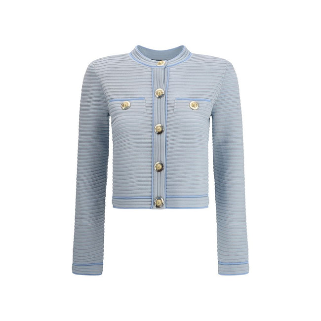 Light Blue Viscose CardiganBalmain’s Cardigan is a garment with a structured design and refined elegance. The front closure with five snap buttons is paired with two trompe-l’œil pockets enriched with decorative metal 