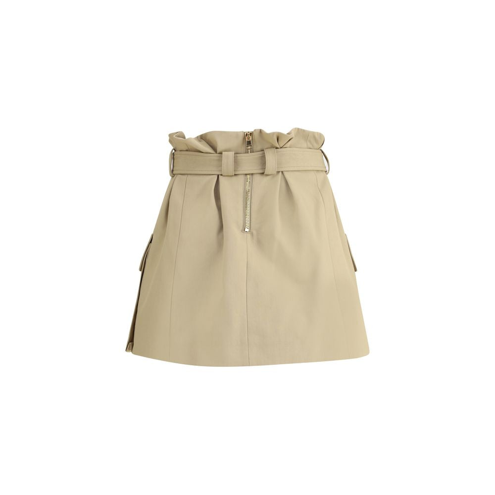 Beige Cotton Mini SkirtBalmain’s cargo Miniskirt reinterprets utility style with a sophisticated twist. Featuring a removable belt with a PB engraved gold metal Anthem buckle, it has two side pockets with gussets and a flap. The back closure with exposed