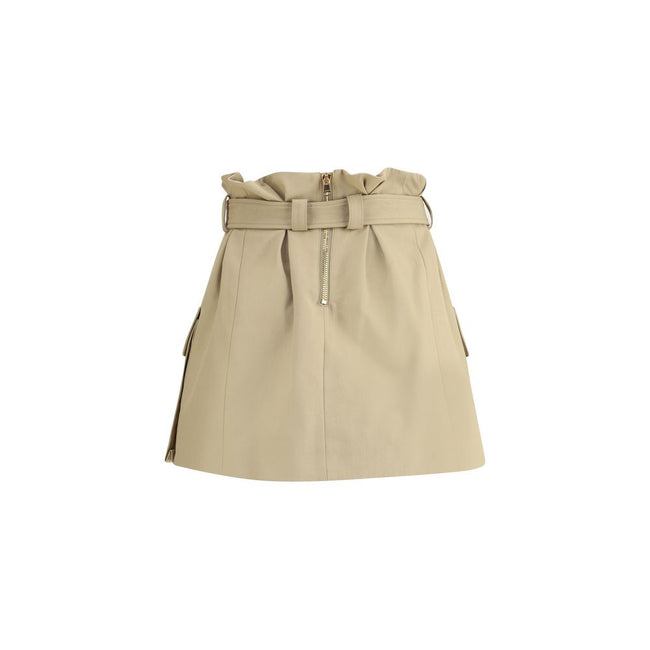 Beige Cotton Mini SkirtBalmain’s cargo Miniskirt reinterprets utility style with a sophisticated twist. Featuring a removable belt with a PB engraved gold metal Anthem buckle, it has two side pockets with gussets and a flap. The back closure with exposed