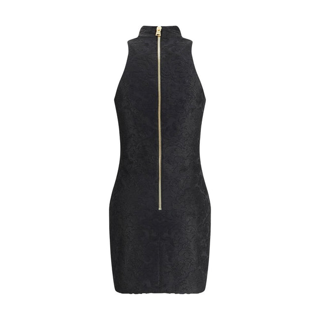 Black Viscose Cocktail DressBalmain’s Baroque short Dress combines elegance and character in a refined design. Made of bouclé fabric with a rich baroque pattern, it features an American collar that enhances the silhouette and a back zipper closure. Gold e