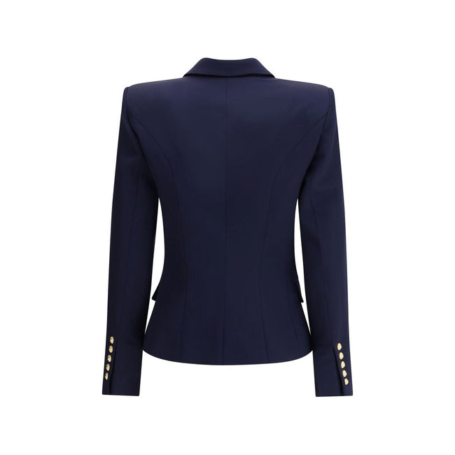 Blue Fleece Wool BlazerThe Balmain double-breasted Blazer is an icon of structured and decisive style. Characterized by stiff shoulders and peak lapels, it enhances the silhouette with an impeccable tailoring line. The front closure with gold embossed but
