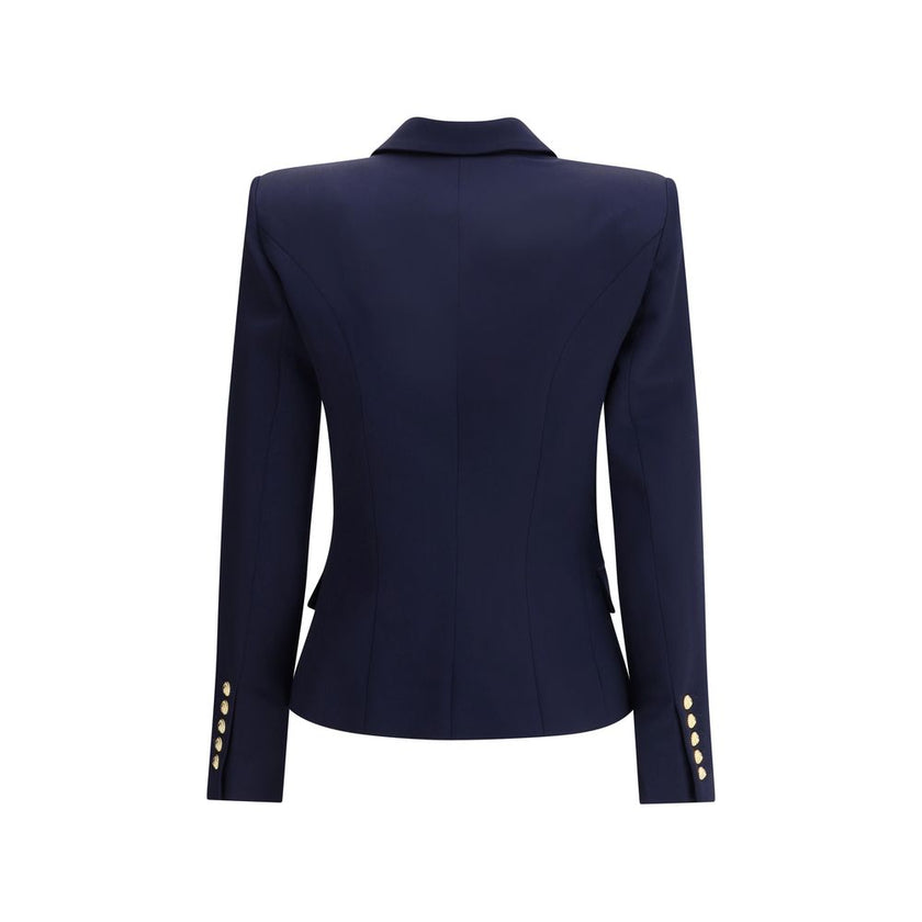 Blue Fleece Wool BlazerThe Balmain double-breasted Blazer is an icon of structured and decisive style. Characterized by stiff shoulders and peak lapels, it enhances the silhouette with an impeccable tailoring line. The front closure with gold embossed but