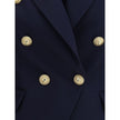Blue Fleece Wool BlazerThe Balmain double-breasted Blazer is an icon of structured and decisive style. Characterized by stiff shoulders and peak lapels, it enhances the silhouette with an impeccable tailoring line. The front closure with gold embossed but