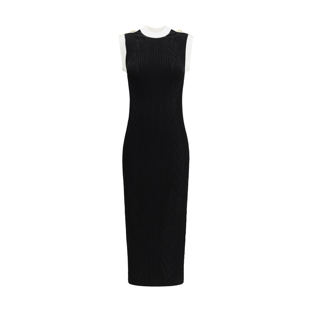 Black Viscose Casual DressBalmain’s Long Dress is a bold and refined garment made of a twisted knit with openwork that enhances the silhouette. The round neckline is framed by a contrasting ribbed finish, also echoed on the armholes. The contrasting strap