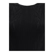 Black Viscose Casual DressBalmain’s Long Dress is a bold and refined garment made of a twisted knit with openwork that enhances the silhouette. The round neckline is framed by a contrasting ribbed finish, also echoed on the armholes. The contrasting strap