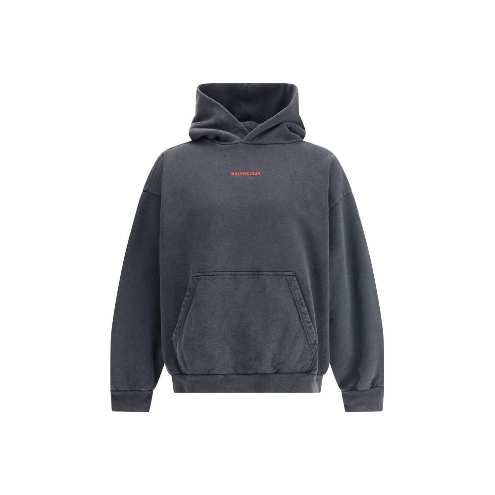 Gray Cotton SweatshirtBalenciaga’s hooded Sweatshirt combines comfort and contemporary style. Featuring an embroidered logo on the front, it features a practical kangaroo pocket, ribbed cuffs and hem ensuring a snug, finished fit. An iconic garment for an