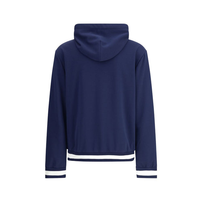 Blue Polyester SweatshirtGucci’s Jersey Hoodie combines comfort and sporty style with the house’s iconic details. Decorated with a striped print and the Gucci logo, it features a fixed hood with drawstring, long sleeves and two side pockets. Striped ribbe