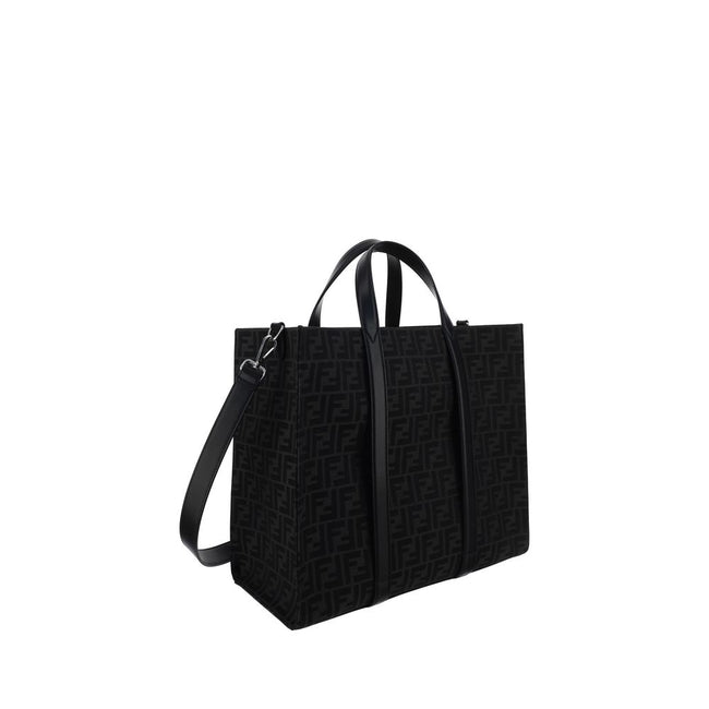 Black Polyester Shoulder BagThe Tote Handbag by Fendi features a double rigid handle at the top, a removable and adjustable leather shoulder strap, and an internal welt pocket with a zipper closure. The exterior is adorned with the brand’s iconic FF print