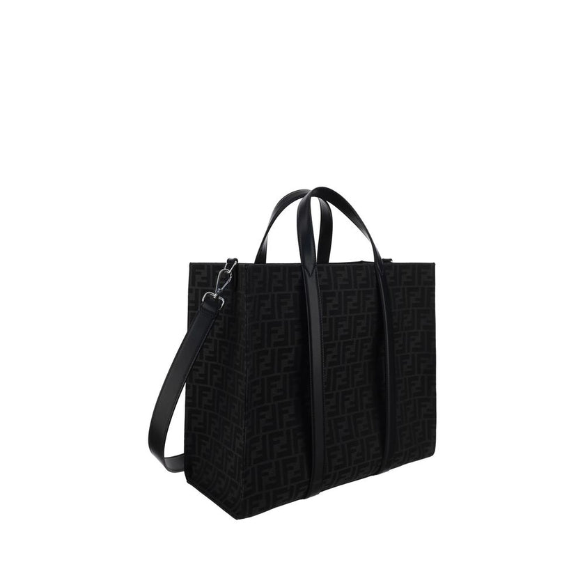 Black Polyester Shoulder BagThe Tote Handbag by Fendi features a double rigid handle at the top, a removable and adjustable leather shoulder strap, and an internal welt pocket with a zipper closure. The exterior is adorned with the brand’s iconic FF print