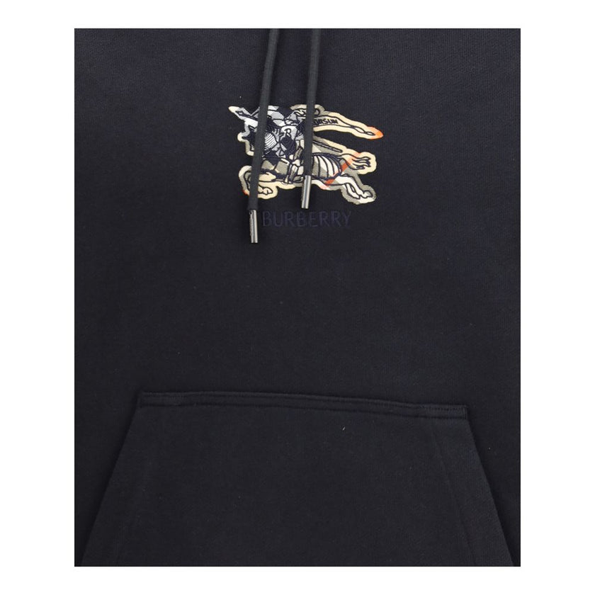 Black Cotton SweatshirtBurberry’s EKD Hoodie combines comfort and sophistication in a distinctive design. Made of lightweight terry-effect cotton with a slim fit, it is embellished with the logo and iconic Equestrian Knight Design embroidered on a sandy b