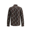 Brown Cotton Pattern ShirtBurberry’s Check cotton flannel Shirt is a timeless classic that combines tradition and contemporary style. Made of soft cotton flannel woven with the famous Burberry Check pattern, it features long sleeves, a button-down collar