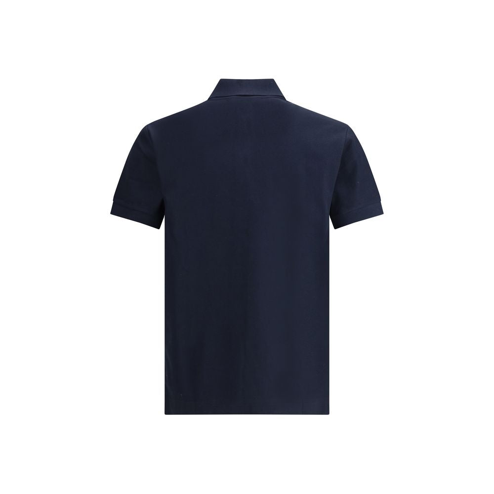 Blue Cotton Polo ShirtBurberry’s cotton polo Shirt is a garment that combines British tradition with distinctive details of great character. Made of soft cotton, it features a ribbed collar that enhances the model’s classic silhouette. The special feature