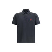 Black Cotton Polo ShirtBalenciaga’s cotton polo shirt reinterprets a wardrobe classic with the brand’s sharp, essential style. Featuring a classic collar with a two-button closure, it has short sleeves with cuffs and an embroidered logo on the chest for a