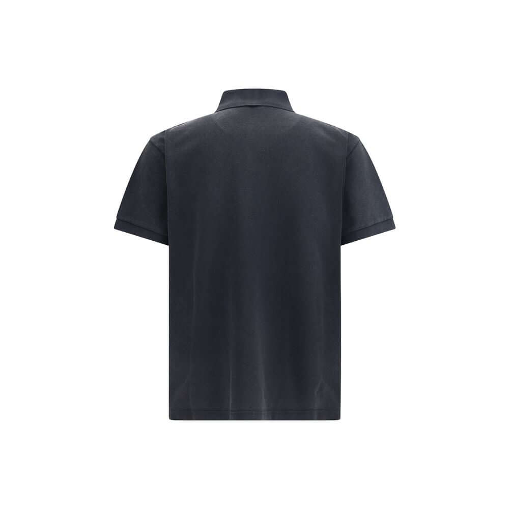 Black Cotton Polo ShirtBalenciaga’s cotton polo shirt reinterprets a wardrobe classic with the brand’s sharp, essential style. Featuring a classic collar with a two-button closure, it has short sleeves with cuffs and an embroidered logo on the chest for a
