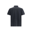 Black Cotton Polo ShirtBalenciaga’s cotton polo shirt reinterprets a wardrobe classic with the brand’s sharp, essential style. Featuring a classic collar with a two-button closure, it has short sleeves with cuffs and an embroidered logo on the chest for a