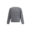 Wool mouliné and cashmere SweaterMoncler’s wool mouliné and cashmere Sweater is a refined garment that combines softness and superior quality. Made of a fine wool and cashmere mouliné blend with a shaved knit of fineness 7, it features a classic crew neck