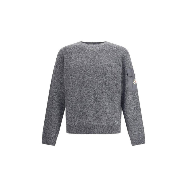 Wool mouliné and cashmere SweaterMoncler’s wool mouliné and cashmere Sweater is a refined garment that combines softness and superior quality. Made of a fine wool and cashmere mouliné blend with a shaved knit of fineness 7, it features a classic crew neck