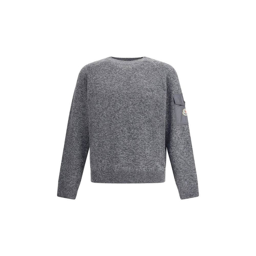 Wool mouliné and cashmere SweaterMoncler’s wool mouliné and cashmere Sweater is a refined garment that combines softness and superior quality. Made of a fine wool and cashmere mouliné blend with a shaved knit of fineness 7, it features a classic crew neck