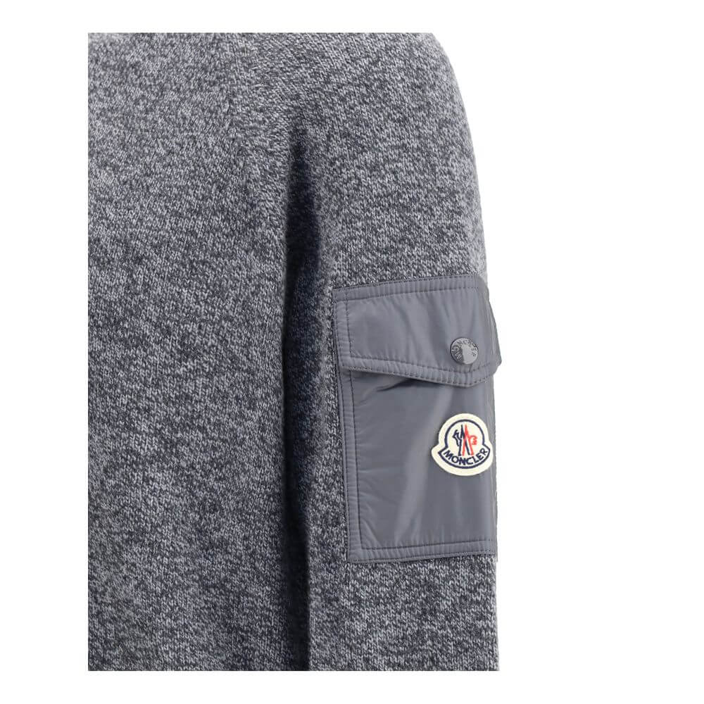 Wool mouliné and cashmere SweaterMoncler’s wool mouliné and cashmere Sweater is a refined garment that combines softness and superior quality. Made of a fine wool and cashmere mouliné blend with a shaved knit of fineness 7, it features a classic crew neck