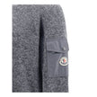 Wool mouliné and cashmere SweaterMoncler’s wool mouliné and cashmere Sweater is a refined garment that combines softness and superior quality. Made of a fine wool and cashmere mouliné blend with a shaved knit of fineness 7, it features a classic crew neck