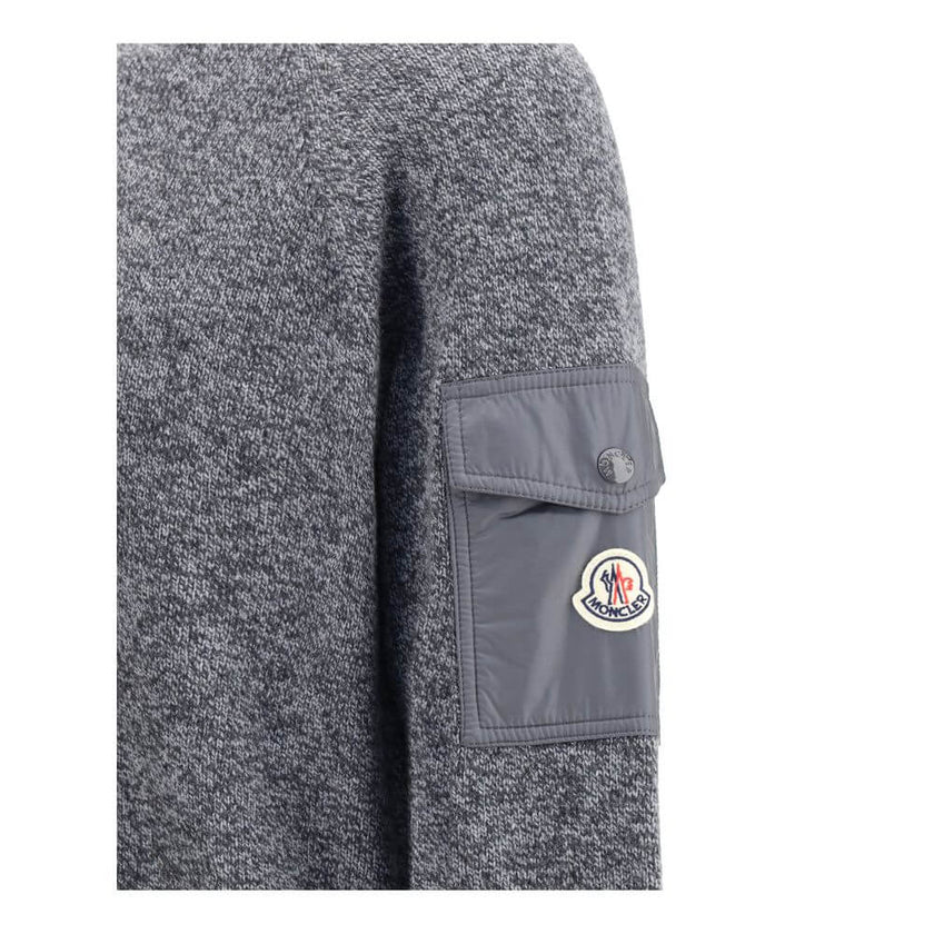 Wool mouliné and cashmere SweaterMoncler’s wool mouliné and cashmere Sweater is a refined garment that combines softness and superior quality. Made of a fine wool and cashmere mouliné blend with a shaved knit of fineness 7, it features a classic crew neck