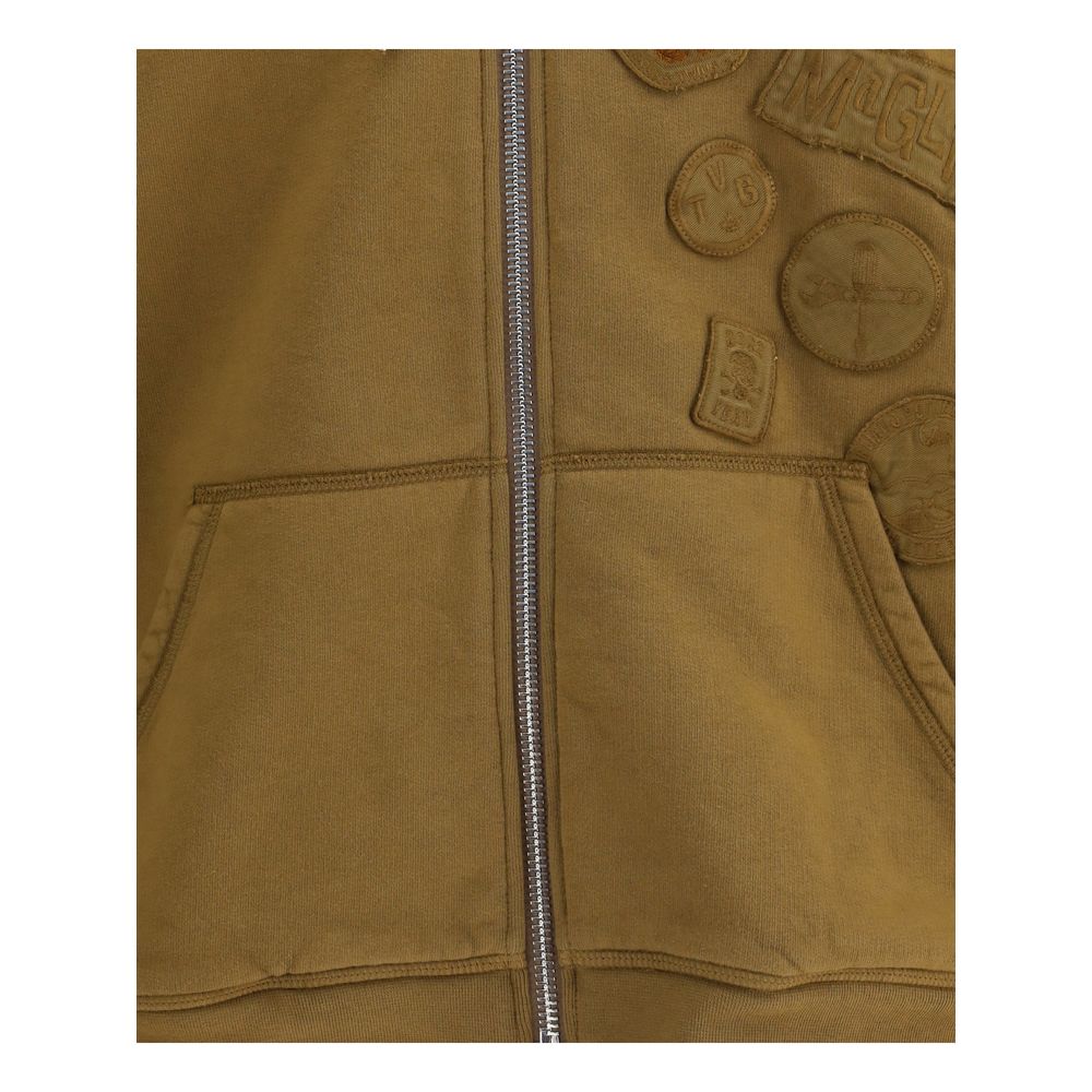 Brown Cotton SweatshirtDsQuared2’s zip Hoodie combines functionality and style in a contemporary design. Featuring a double-slider zipper closure and two patch pockets on the front, it provides practicality and comfort. The adjustable hood with drawstring