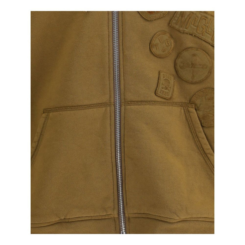 Brown Cotton SweatshirtDsQuared2’s zip Hoodie combines functionality and style in a contemporary design. Featuring a double-slider zipper closure and two patch pockets on the front, it provides practicality and comfort. The adjustable hood with drawstring
