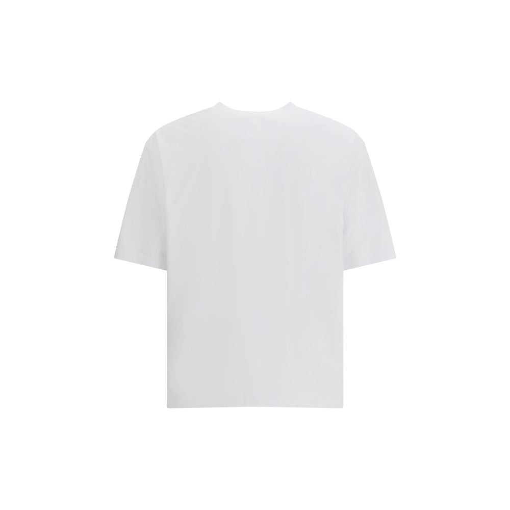 White Cotton T-ShirtDsquared2’s cotton T-Shirt is an essential garment with a distinctive urban spirit. Made of soft and comfortable cotton, it features a classic ribbed crew neck that ensures an impeccable fit. On the front stands out the logo print, an