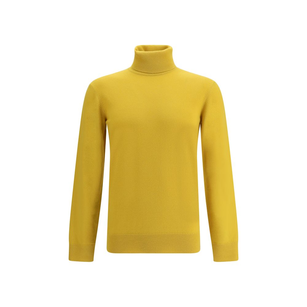 Yellow Cashmere TurtleneckThe Saint Laurent Cashmere Turtleneck Sweater is an essential garment with a sophisticated and timeless style. Made of high-quality wool, it offers warmth and comfort, ideal for the colder seasons. The high ribbed collar, along w