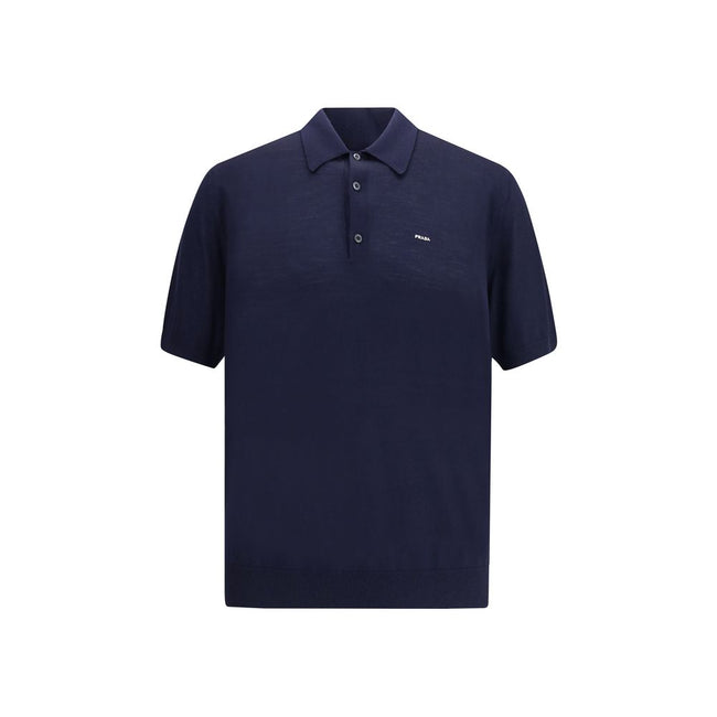 Blue Fleece Wool Polo ShirtPrada’s virgin wool polo Sweater combines elegance and simplicity in a timeless design. Featuring a classic ribbed collar, it has a matching hem and a discreet logo on the front, understatedly signing the garment’s refined aesth