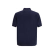 Blue Fleece Wool Polo ShirtPrada’s virgin wool polo Sweater combines elegance and simplicity in a timeless design. Featuring a classic ribbed collar, it has a matching hem and a discreet logo on the front, understatedly signing the garment’s refined aesth