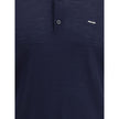 Blue Fleece Wool Polo ShirtPrada’s virgin wool polo Sweater combines elegance and simplicity in a timeless design. Featuring a classic ribbed collar, it has a matching hem and a discreet logo on the front, understatedly signing the garment’s refined aesth