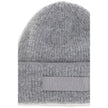 Gros Grain Ribbed BeanieThe Gros Grain Ribbed Beanie by Jacquemus combines style and functionality. The adjustable fit ensures comfort, while the contrasting folded brim and tone-on-tone gros-grain logo embroidered on the front complete the design with a