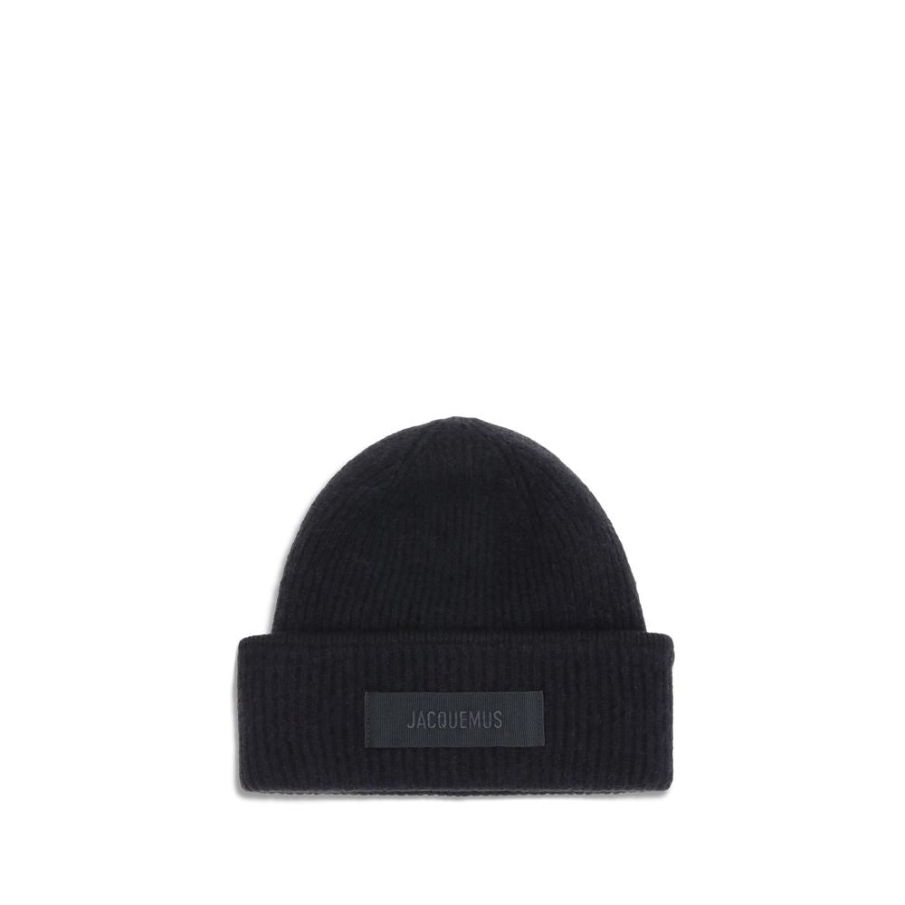 Black Alpaca Vicugna Pacos BeanieThe Gros Grain Ribbed Beanie by Jacquemus combines style and functionality. The adjustable fit ensures comfort, while the contrasting folded brim and tone-on-tone gros-grain logo embroidered on the front complete the desig