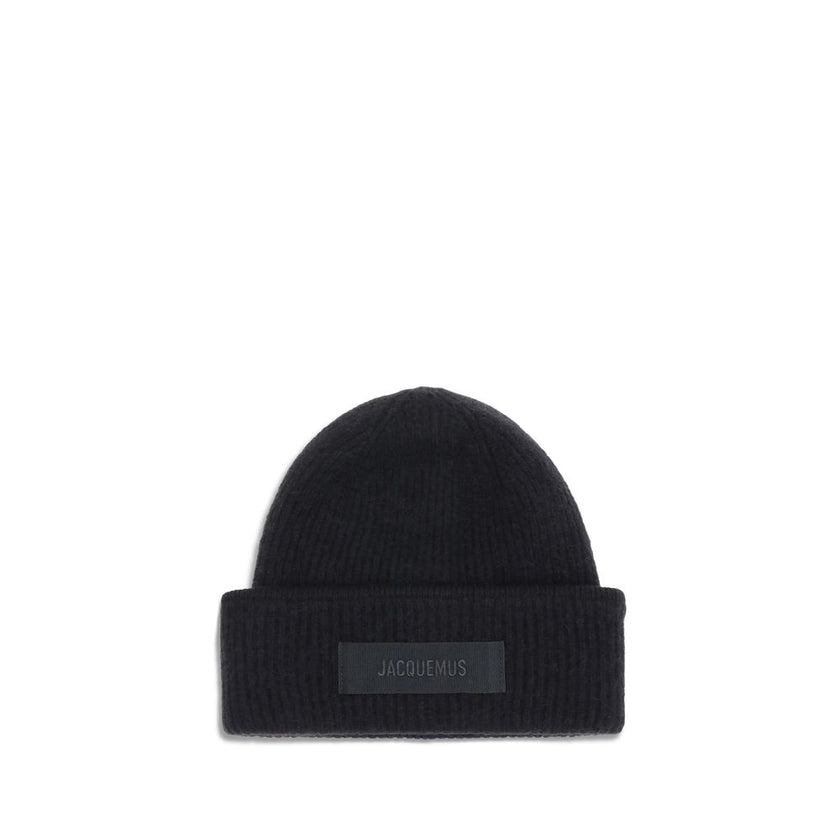 Black Alpaca Vicugna Pacos BeanieThe Gros Grain Ribbed Beanie by Jacquemus combines style and functionality. The adjustable fit ensures comfort, while the contrasting folded brim and tone-on-tone gros-grain logo embroidered on the front complete the desig