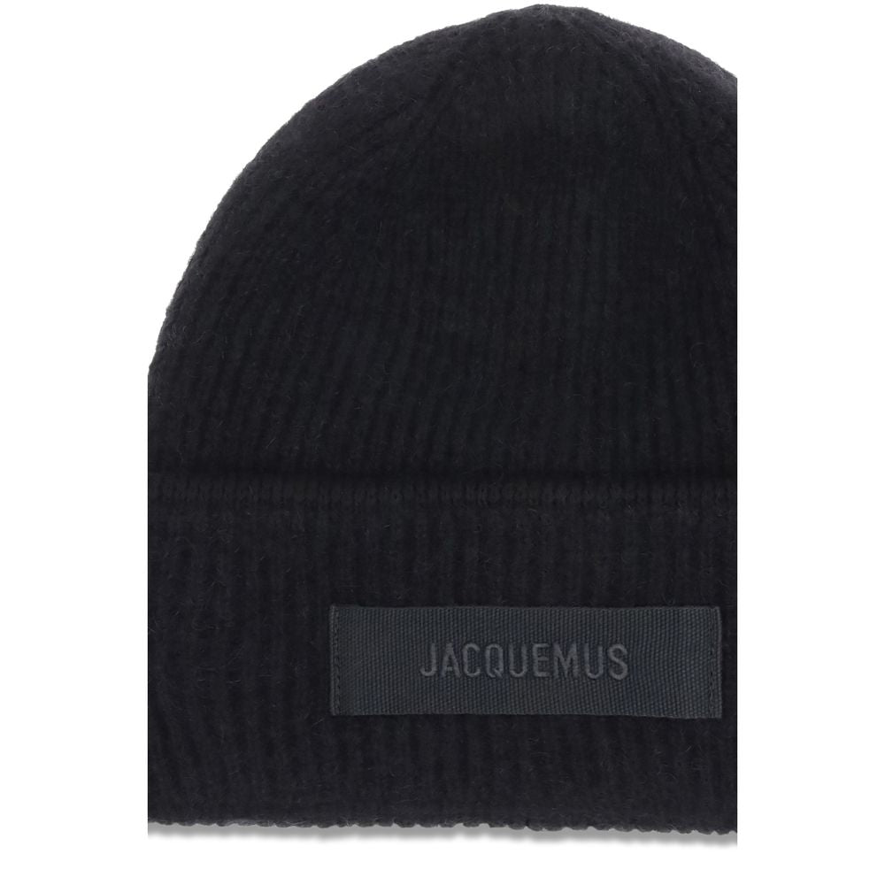 Black Alpaca Vicugna Pacos BeanieThe Gros Grain Ribbed Beanie by Jacquemus combines style and functionality. The adjustable fit ensures comfort, while the contrasting folded brim and tone-on-tone gros-grain logo embroidered on the front complete the desig