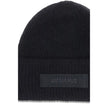 Black Alpaca Vicugna Pacos BeanieThe Gros Grain Ribbed Beanie by Jacquemus combines style and functionality. The adjustable fit ensures comfort, while the contrasting folded brim and tone-on-tone gros-grain logo embroidered on the front complete the desig